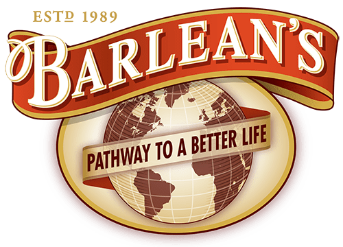 The Barlean's logo. On top, an unfurled red ribbon with gold border says Barlean's in white. Below it, there is a gold and brown globe inside of a gold oval. A banner over the globe says 'pathway to a better life'