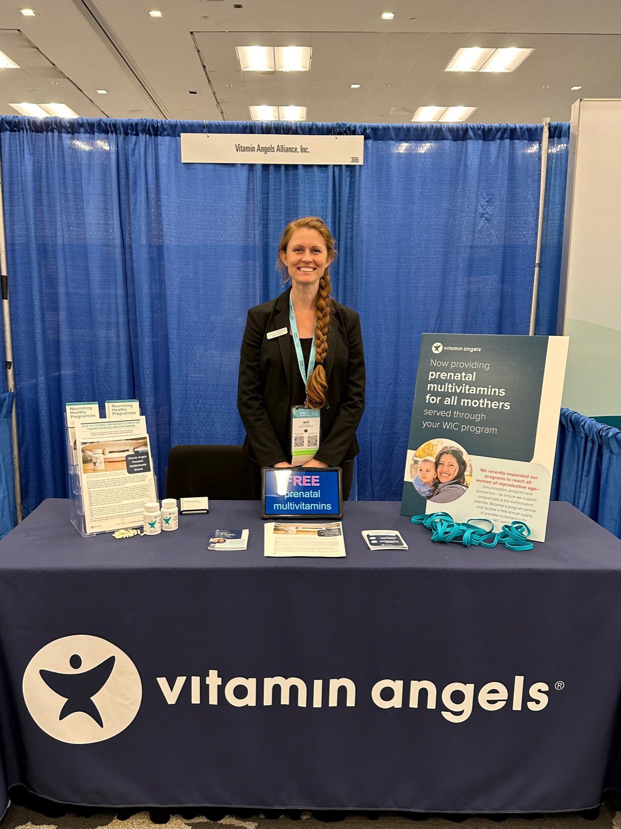 Bridget Quanstrom at the Vitamin Angels booth at the National WIC Association Conference 2023