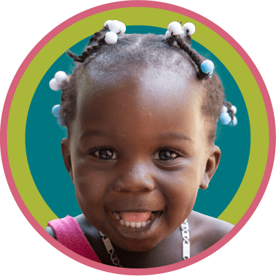 Smiling child in colorful circles
