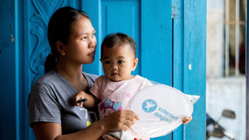 A Filipina mother holding her baby