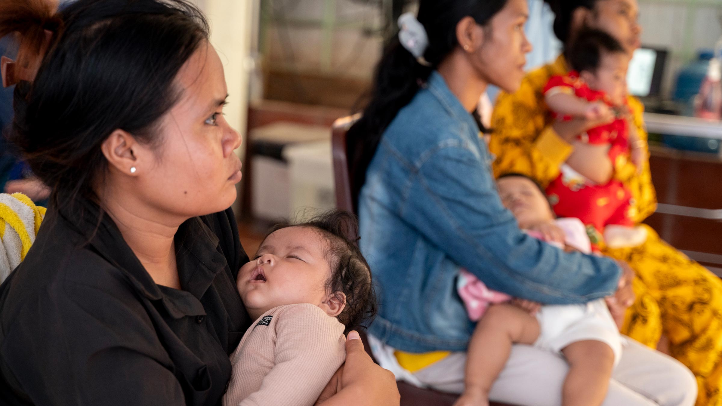 Moms and their newborns attend a class at CCF to learn about proper postpartum care.