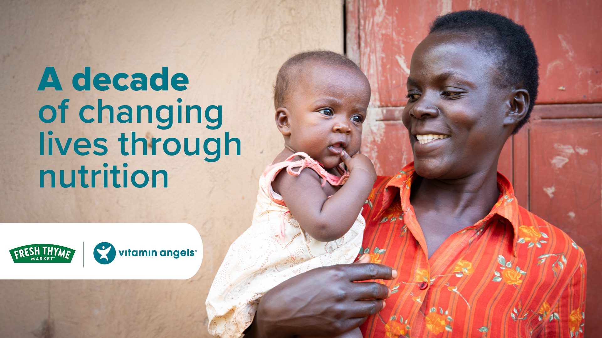 Smiling mother holding her infant child with the text, "A decade of changing lives through nutrition" and the Fresh Thyme Marketing and Vitamin Angels logos. 