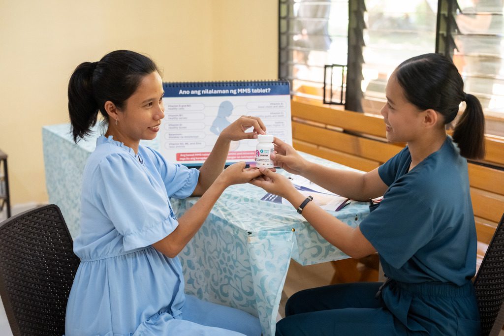 Woman receiving counseling on MMS